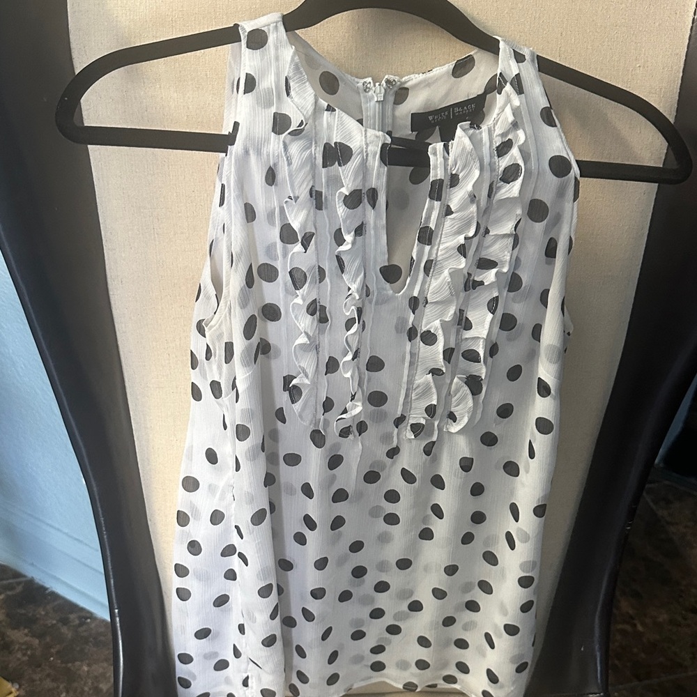 Priced to sell!
White House Black Market Ruffled Polka Dot Blouse